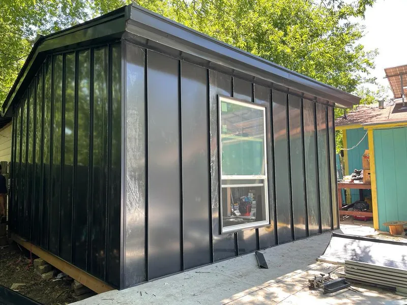 Black standing seam metal wall panels for Metal Roof Installation in Sun Village