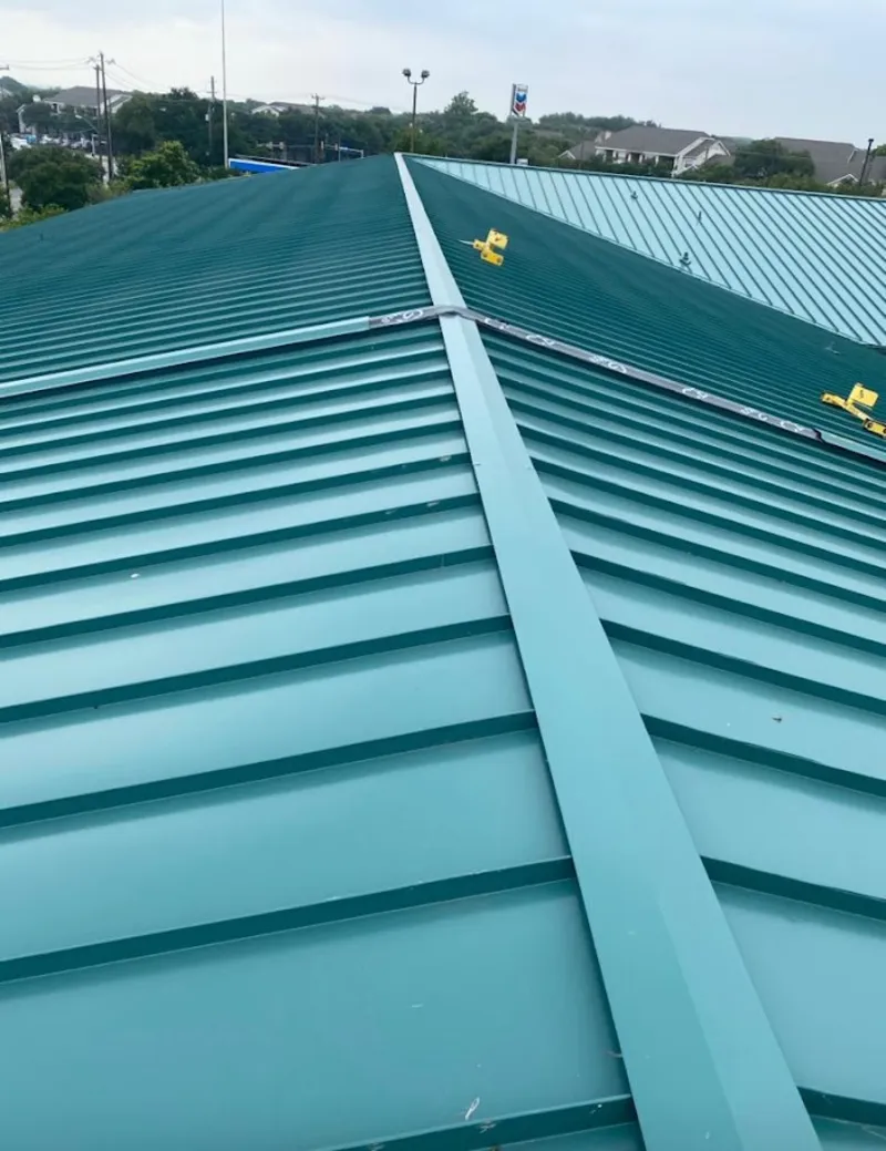 Green commercial metal roof ridge and valley for Metal Roof Repair in Sun Village